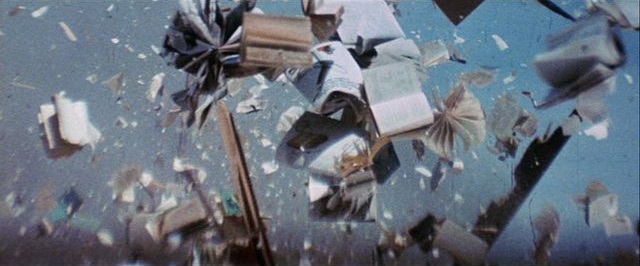 Scene from Zabriskie Points with books exploding