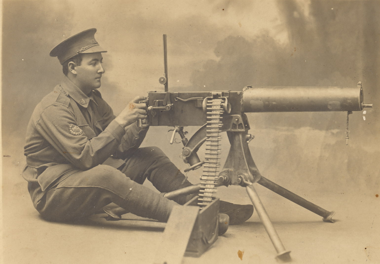 Eric William Bambrick, gunner, posing with machine gun before departing for the "Great" war